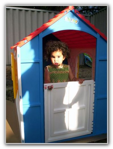 Ebony in her toy house